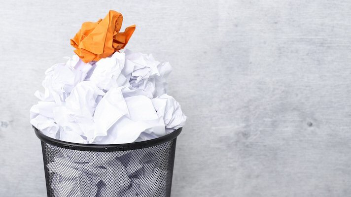 White paper in the trash can